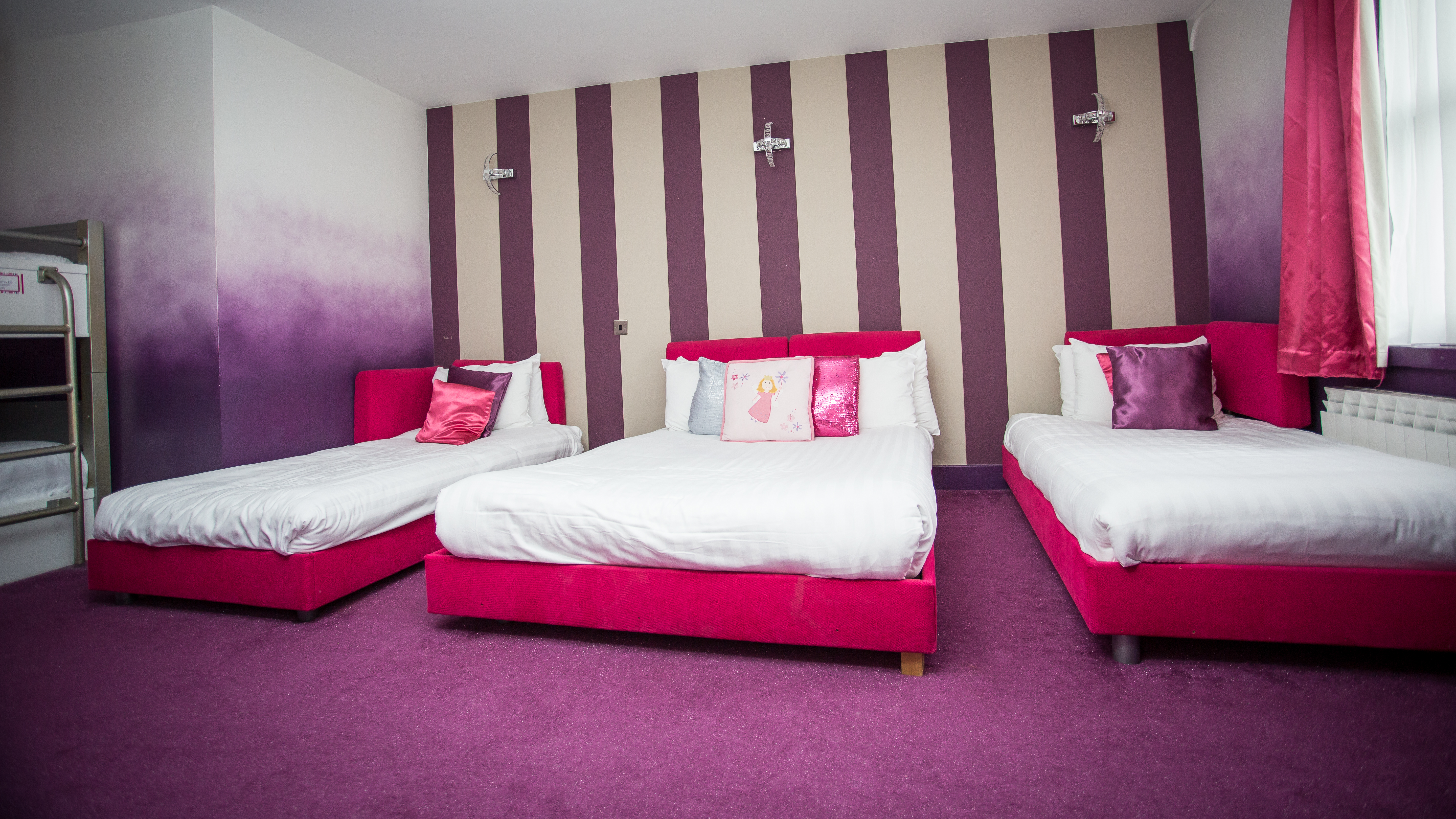 Pink & purple sleepover room beds