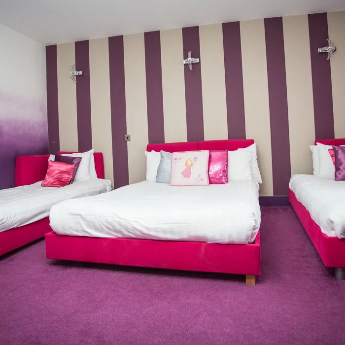 Pink & purple sleepover room beds