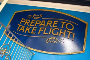 Prepare to take flight sign at Skyride