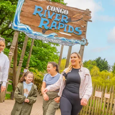 A group of people at the Congo River Rapids entrance at Alton Towers Resort